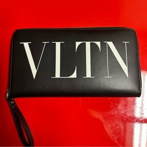 EUC: Valentino Garavani black zip around continental wallet